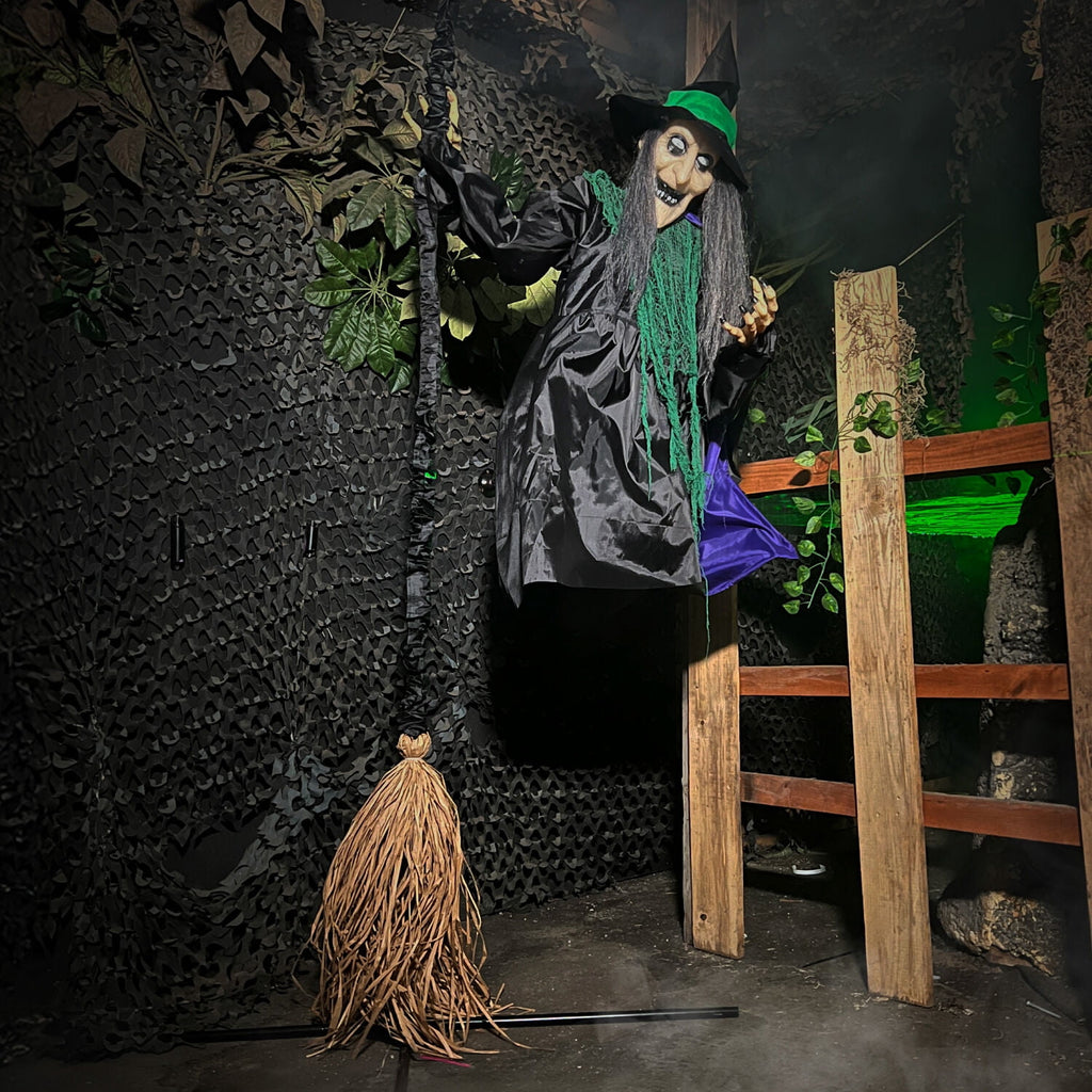 Haunted Hill Farm 6.0-Ft. Touch-Activated Mounted Flying Witch Halloween Animatronic