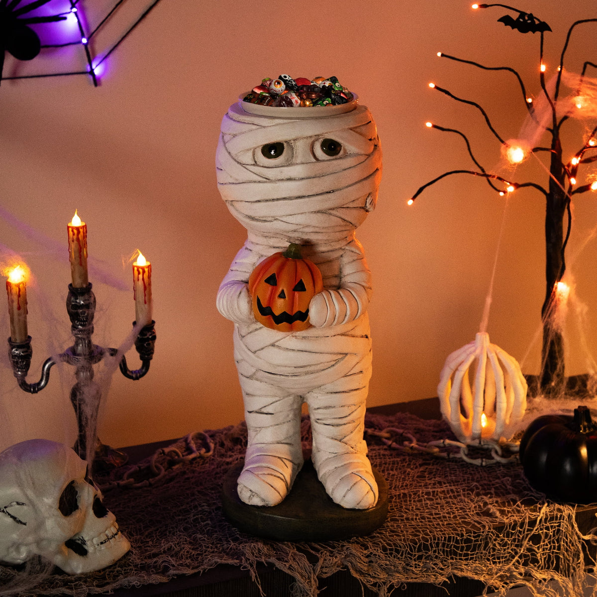 Mummy Holding Carved Pumpkin Halloween Decoration - 19.5"